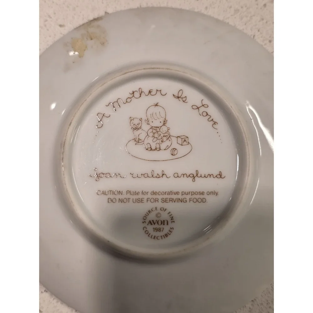 Set of 8 Avon Collectable Plates 1980s